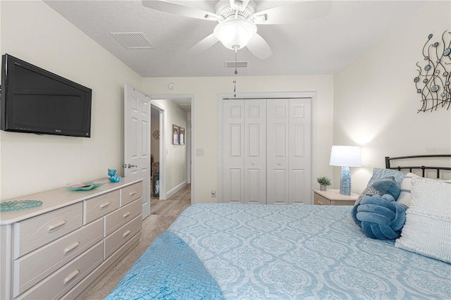 bedroom with a closet and ceiling fan