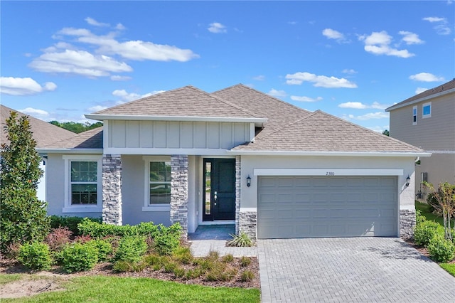 view of front of property featuring a garage