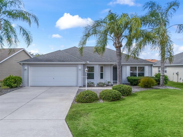 single story home with a front lawn and a garage