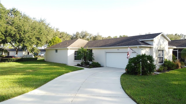 single story home featuring a front lawn and a garage