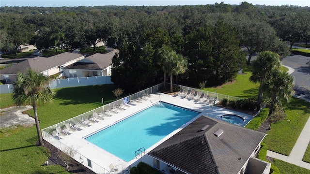 view of pool featuring a patio area and a lawn