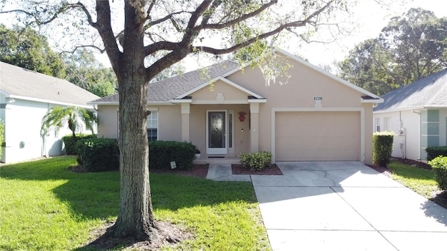 single story home with a front lawn and a garage