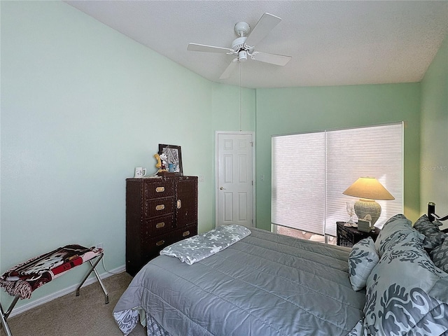 bedroom featuring ceiling fan, carpet flooring, and vaulted ceiling