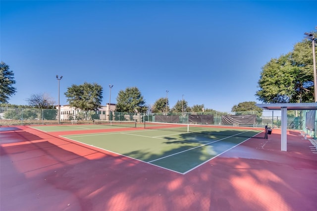 view of sport court featuring basketball hoop