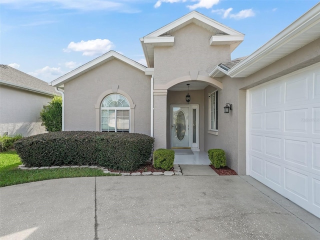 property entrance featuring a garage