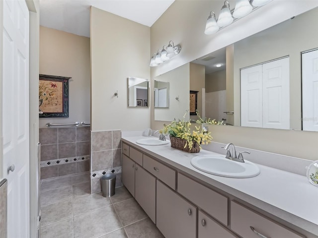 bathroom featuring vanity and tile patterned flooring