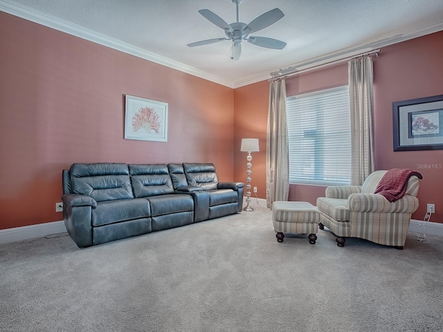 living room with crown molding, a textured ceiling, carpet, and ceiling fan