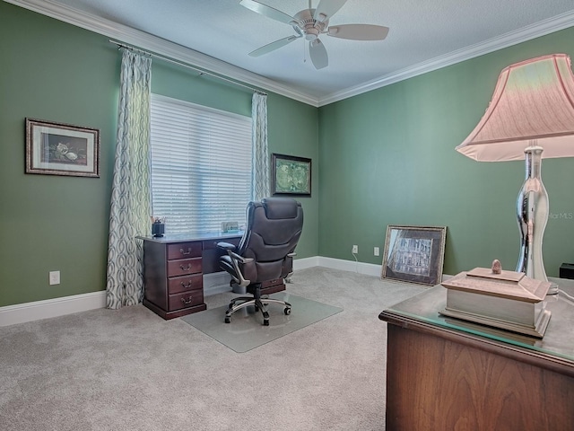 carpeted home office with ceiling fan, crown molding, and a textured ceiling