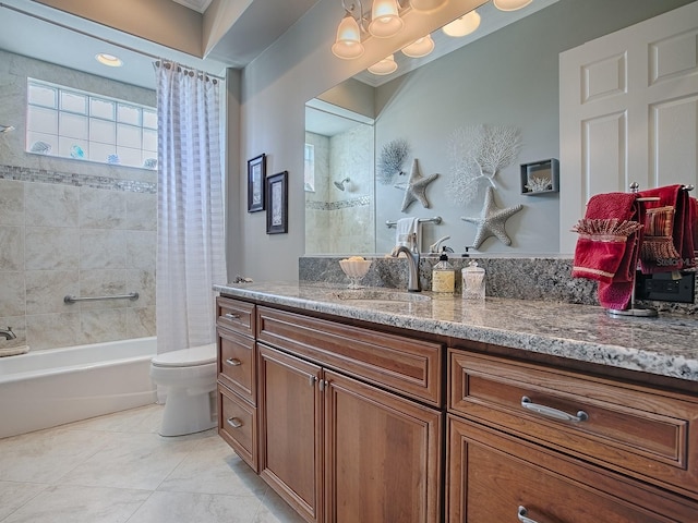 full bathroom featuring toilet, vanity, and shower / tub combo