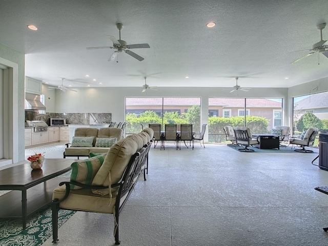 living room featuring a textured ceiling