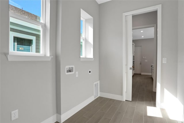 laundry area featuring hookup for an electric dryer and hookup for a washing machine