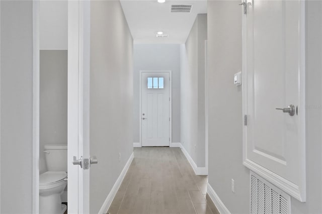 hall featuring light hardwood / wood-style floors