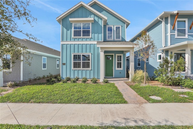 view of front of house with a front lawn