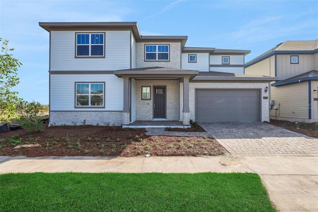 view of front of home featuring a garage