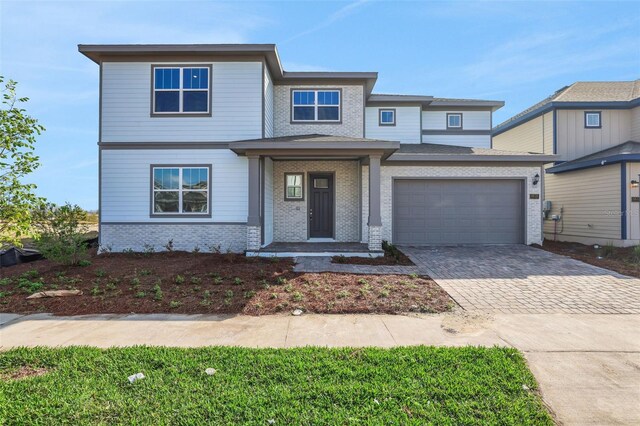 view of front of home with a garage