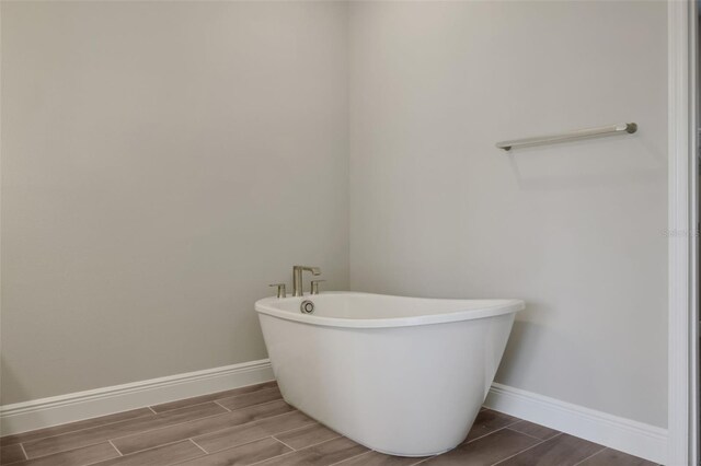 bathroom featuring a tub