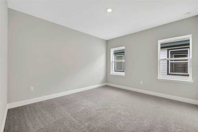 view of carpeted spare room