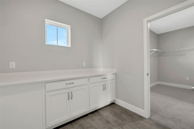 bathroom with wood-type flooring