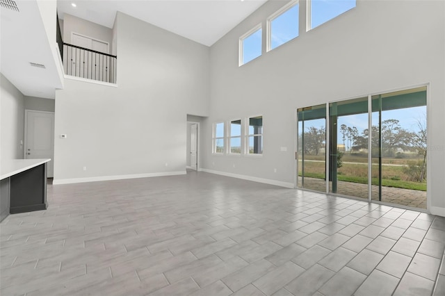 unfurnished living room with light hardwood / wood-style floors