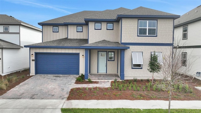 view of front of home with a garage