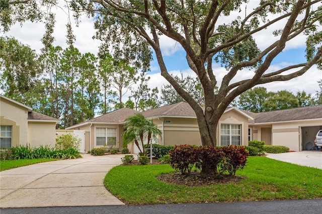 single story home featuring a garage