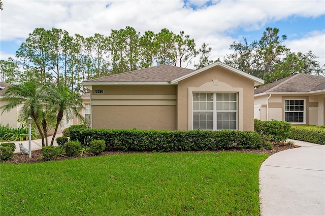 view of front of home featuring a front yard