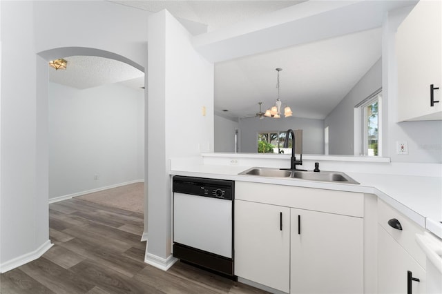 kitchen with dishwasher, white cabinets, ceiling fan with notable chandelier, hanging light fixtures, and sink