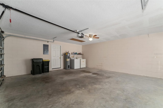 garage with electric panel, water heater, washer and clothes dryer, and a garage door opener