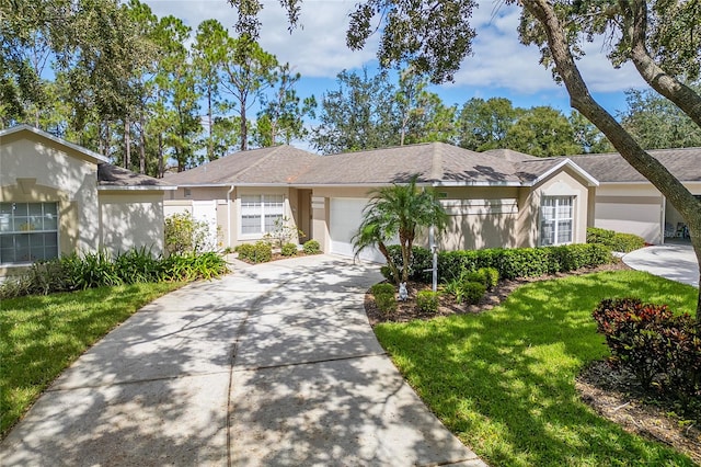 ranch-style home with a garage and a front yard