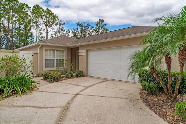 ranch-style home featuring a garage