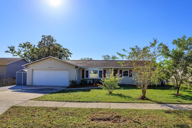 ranch-style house with a front yard and a garage