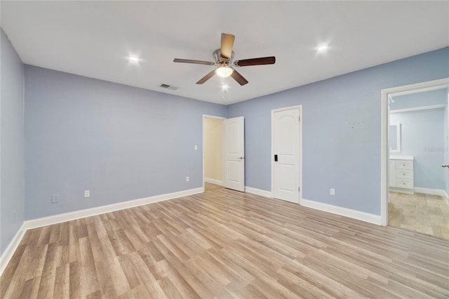 unfurnished bedroom featuring ceiling fan, connected bathroom, and light hardwood / wood-style flooring