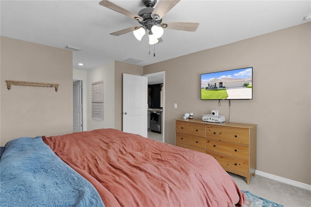 bedroom with ceiling fan and light colored carpet