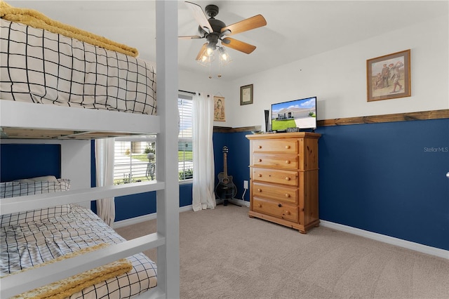 bedroom featuring ceiling fan and carpet floors