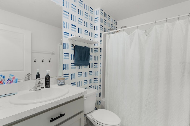 full bathroom featuring shower / tub combo with curtain, vanity, and toilet