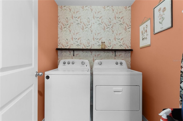 laundry room featuring washer and clothes dryer