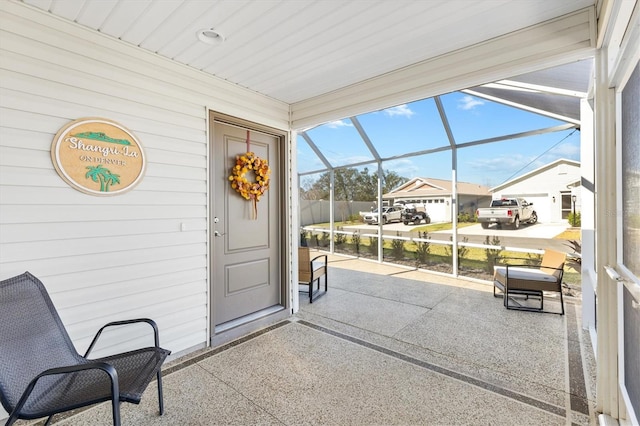 sunroom / solarium featuring plenty of natural light