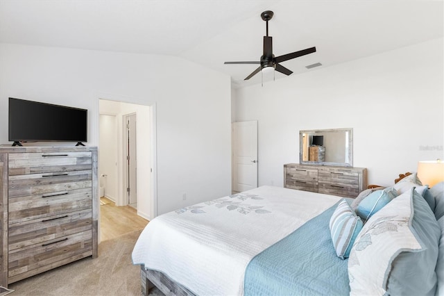 carpeted bedroom with lofted ceiling and ceiling fan