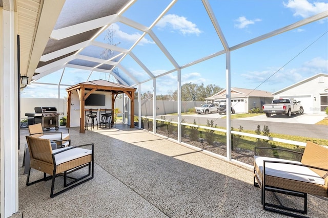 sunroom / solarium featuring lofted ceiling