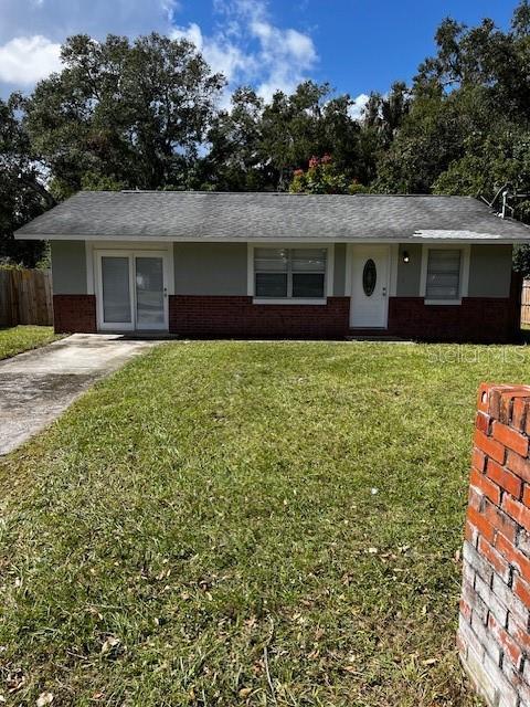 620 Gould St, Eustis, FL 32726 - single story home with brick siding