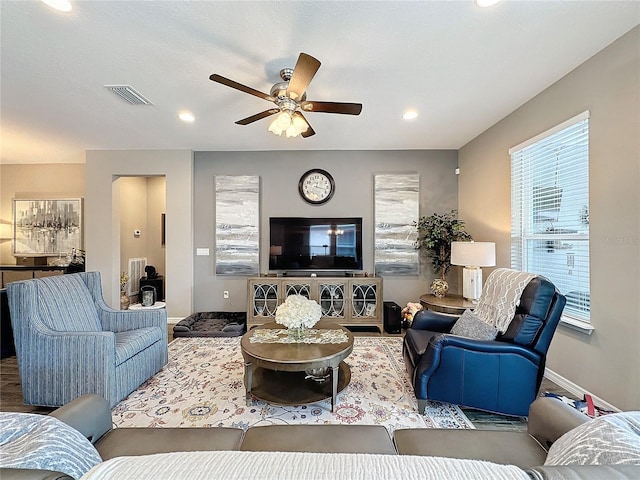 living room with ceiling fan