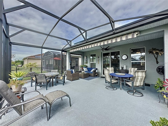 view of patio / terrace featuring an outdoor hangout area, a lanai, and ceiling fan