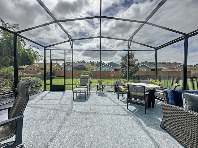 view of patio / terrace with a lanai