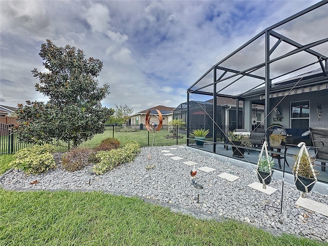 view of yard featuring a patio area and a lanai