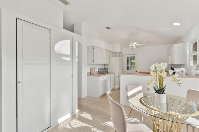 dining room featuring ceiling fan