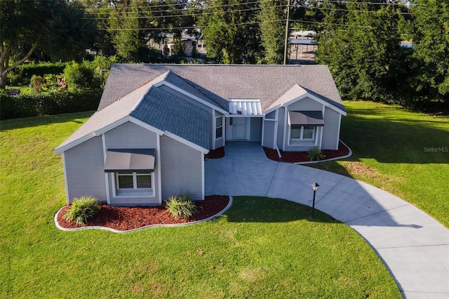 view of front of home with a front lawn