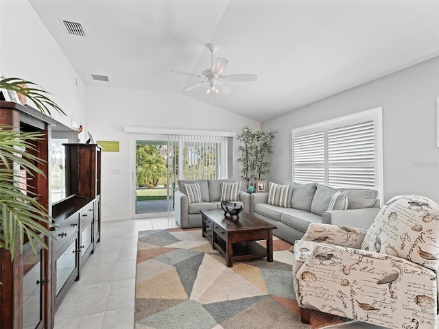 tiled living room with vaulted ceiling and ceiling fan