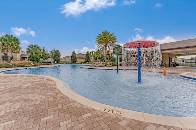 view of pool featuring a patio and pool water feature