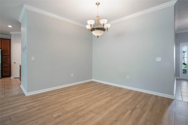 empty room featuring an inviting chandelier, ornamental molding, and light wood-type flooring