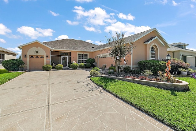 ranch-style home featuring a garage